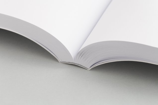 Bok med softcover og liminnbinding – eksempel på profesjonell bokbinding